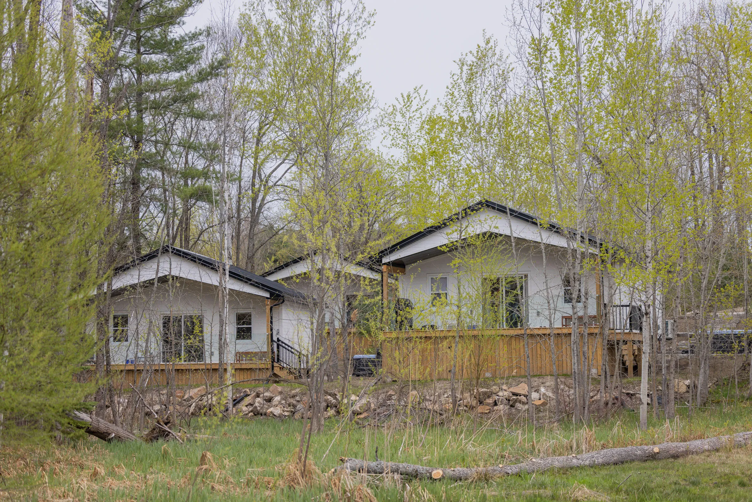 Inspire Beach Resort's cabins among the trees, each with its own timber deck.